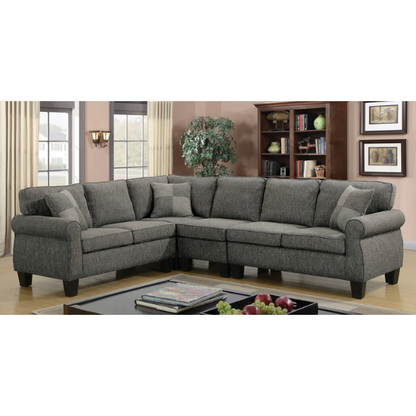 Dark grey transitional L-shaped sectional sofa with rolled arms, welt-trimmed cushions, and checkerboard accent pillows