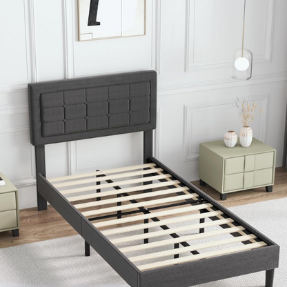 Dark grey twin-size upholstered platform bed with button-tufted adjustable headboard, wooden slats, steel center support, and underbed storage clearance.

