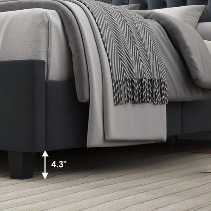 Dark grey velvet king-size platform bed with tall tufted wingback headboard, nailhead trim, and no box spring required

