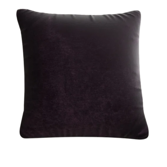 Dark purple crushed velvet throw pillow, 16x16 square design with soft texture and reversible fabric, styled on a modern sofa for cozy, luxurious home decor.

