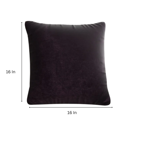 Dark purple crushed velvet throw pillow, 16x16 square design with soft texture and reversible fabric, styled on a modern sofa for cozy, luxurious home decor.

