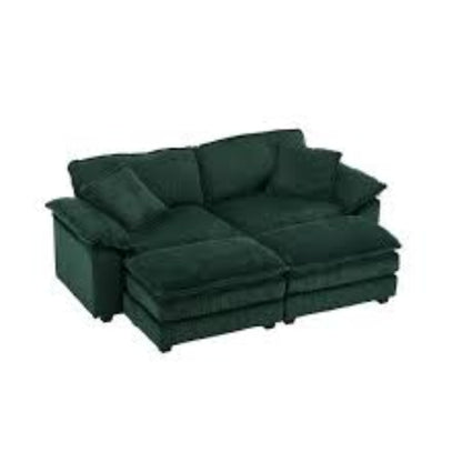 Modern emerald green ribbed velvet corduroy sofa with foam cushioning and pocket spring system, featuring a sturdy wood frame, plush back pillows, and sleek black plastic legs for superior comfort and stylish design.