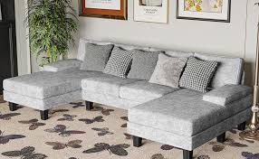 U-shaped sectional sofa with chaise lounges, featuring luxurious grey velvet upholstery, high-density foam, and spring pack for ultimate comfort. Spacious enough to seat 4 people, with removable, machine-washable covers for easy cleaning. Perfect for family rooms or entertaining guests.