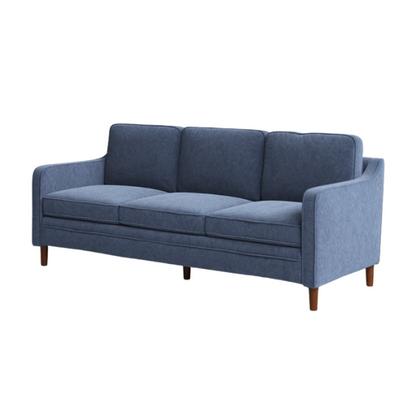 Dusty blue chenille upholstered sofa featuring curved track arms, tapered wooden legs, and foam-filled cushions in a mid-century modern design.