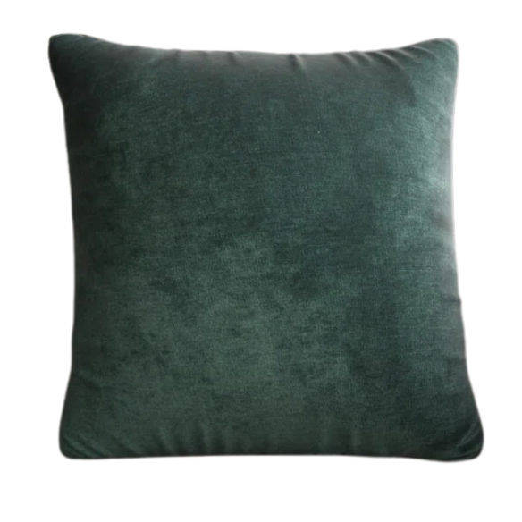 Emerald green crushed velvet throw pillow, 16x16 square design with soft texture and reversible fabric, styled on a modern sofa for vibrant, luxurious home decor.


