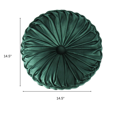 Emerald green velvet round throw pillows with hand-pleated detail and central button, 14.5-inch set of two on a white sofa in a stylish living room.

