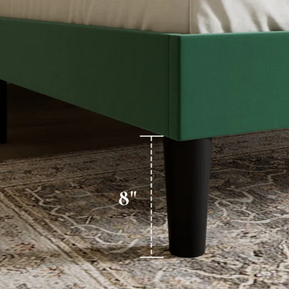 Emerald green full-size velvet platform bed with tufted wingback headboard and solid wood frame