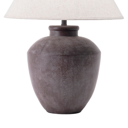 Farmhouse-style 30-inch table lamp with gray resin urn-shaped base and beige empire fabric shade, ideal for living room or bedroom accent lighting

