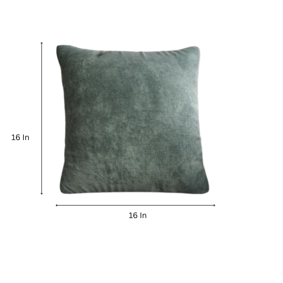 Forest green crushed velvet throw pillow, 16x16 square design with soft texture and reversible fabric, styled on a modern sofa for cozy, nature-inspired home decor.

