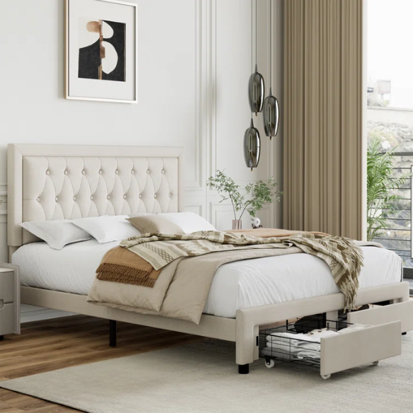 Full-size beige linen upholstered bed with tufted headboard and two underbed storage drawers