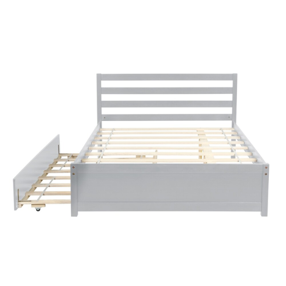 Full size grey wooden platform bed frame with headboard and four underbed storage drawers, modern design ideal for stylish bedroom organization.