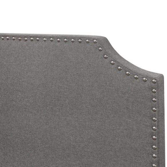 Full-size upholstered gray bed with nailhead trim headboard, compatible with adjustable bases