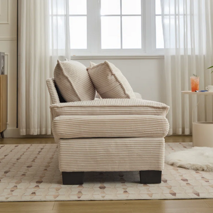 84-inch beige corduroy loveseat with striped upholstery, pillow-top arms, and two accent pillows—modern, low-profile design for living rooms or small spaces.