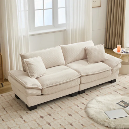 84-inch beige corduroy loveseat with striped upholstery, pillow-top arms, and two accent pillows—modern, low-profile design for living rooms or small spaces.

