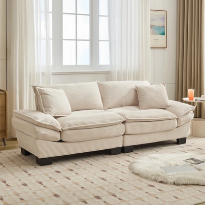 84-inch beige corduroy loveseat with striped upholstery, pillow-top arms, and two accent pillows—modern, low-profile design for living rooms or small spaces.