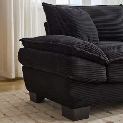 84-inch black corduroy loveseat with striped upholstery, pillow-top arms, and two accent pillows—modern, low-profile design ideal for contemporary living rooms or compact spaces.

