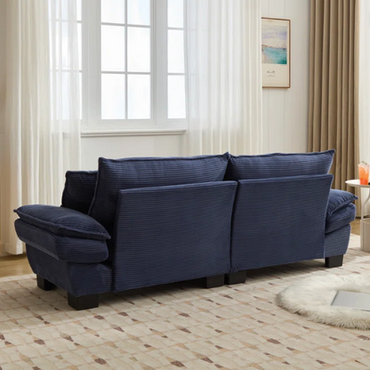 84-inch blue corduroy loveseat with striped upholstery, pillow-top arms, and two accent pillows—modern, low-profile design ideal for stylish living rooms or small spaces.

