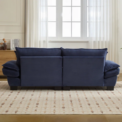 84-inch blue corduroy loveseat with striped upholstery, pillow-top arms, and two accent pillows—modern, low-profile design ideal for stylish living rooms or small spaces.

