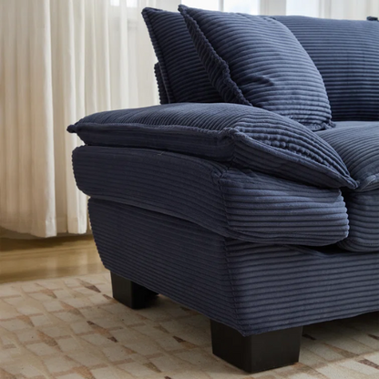 84-inch blue corduroy loveseat with striped upholstery, pillow-top arms, and two accent pillows—modern, low-profile design ideal for stylish living rooms or small spaces.

