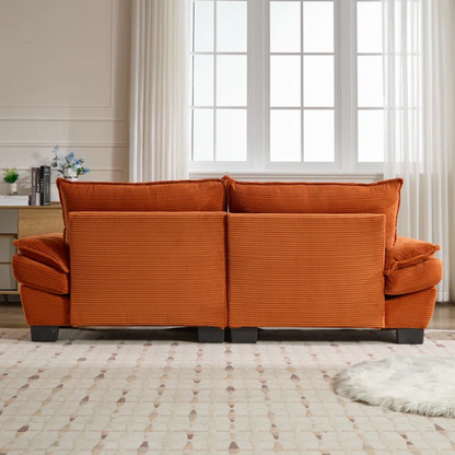 84-inch burnt orange corduroy loveseat with striped upholstery, pillow-top arms, and two accent pillows—modern, low-profile design ideal for vibrant, stylish interiors.

