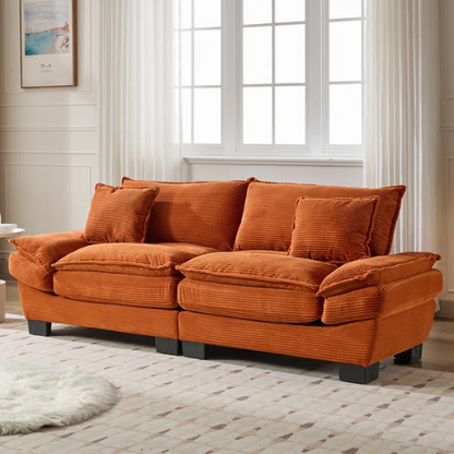 84-inch burnt orange corduroy loveseat with striped upholstery, pillow-top arms, and two accent pillows—modern, low-profile design ideal for vibrant, stylish interiors.

