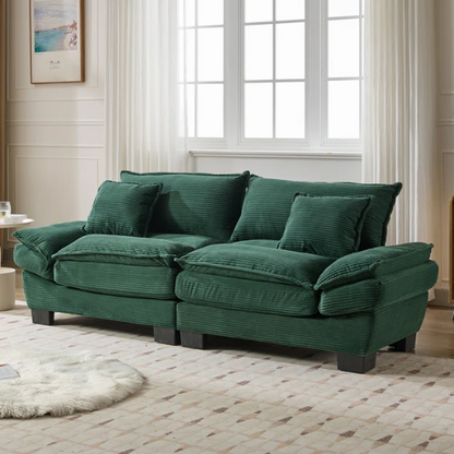 84-inch dark green corduroy loveseat with striped upholstery, pillow-top arms, and two accent pillows—modern, low-profile design ideal for stylish living rooms, offices, or apartments.


