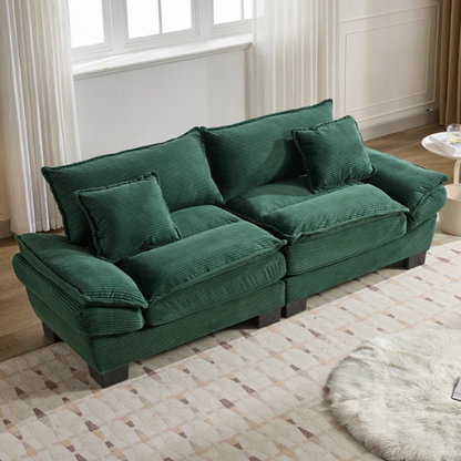 84-inch dark green corduroy loveseat with striped upholstery, pillow-top arms, and two accent pillows—modern, low-profile design ideal for stylish living rooms, offices, or apartments.


