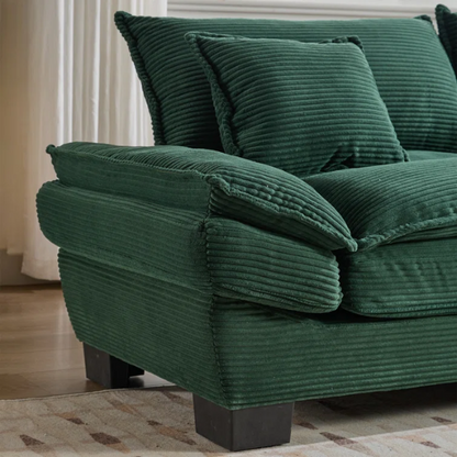 84-inch dark green corduroy loveseat with striped upholstery, pillow-top arms, and two accent pillows—modern, low-profile design ideal for stylish living rooms, offices, or apartments.


