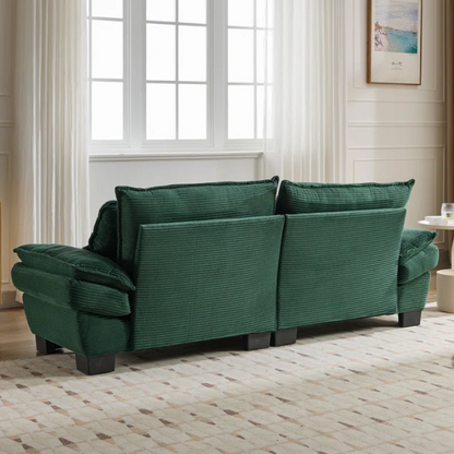 84-inch dark green corduroy loveseat with striped upholstery, pillow-top arms, and two accent pillows—modern, low-profile design ideal for stylish living rooms, offices, or apartments.

