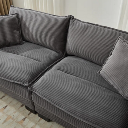 84-inch grey corduroy loveseat with striped upholstery, pillow-top arms, and two accent pillows—modern, low-profile design ideal for living rooms, apartments, or home offices.

