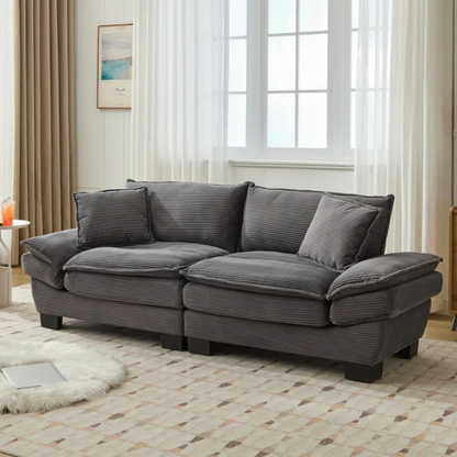 84-inch grey corduroy loveseat with striped upholstery, pillow-top arms, and two accent pillows—modern, low-profile design ideal for living rooms, apartments, or home offices.

