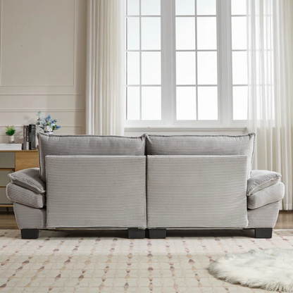 84-inch light grey corduroy loveseat with striped upholstery, pillow-top arms, and two accent pillows—modern, neutral-toned sofa ideal for living rooms, apartments, and minimalist spaces.


