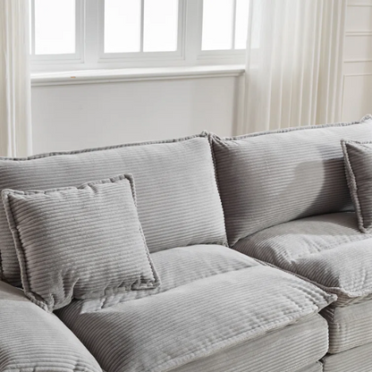 84-inch light grey corduroy loveseat with striped upholstery, pillow-top arms, and two accent pillows—modern, neutral-toned sofa ideal for living rooms, apartments, and minimalist spaces.


