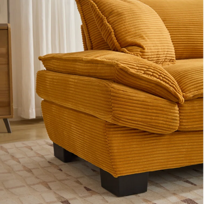 84-inch mustard yellow corduroy loveseat with striped upholstery, pillow-top arms, and two accent pillows—modern, low-profile design ideal for stylish living rooms, apartments, or creative spaces.


