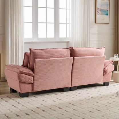 84-inch pink corduroy loveseat with striped upholstery, pillow-top arms, and two accent pillows—modern, playful design ideal for living rooms, apartments, or stylish bedrooms.


