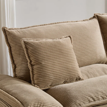 84-inch taupe corduroy loveseat with striped upholstery, pillow-top arms, and two accent pillows—neutral, low-profile design perfect for modern, minimalist, or transitional interiors.

