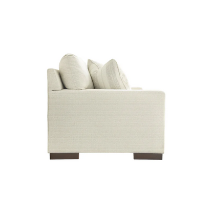 Beige 3-seater sofa with clean-lined silhouette, plush reversible cushions, and neutral polyester upholstery for modern and casual spaces.

