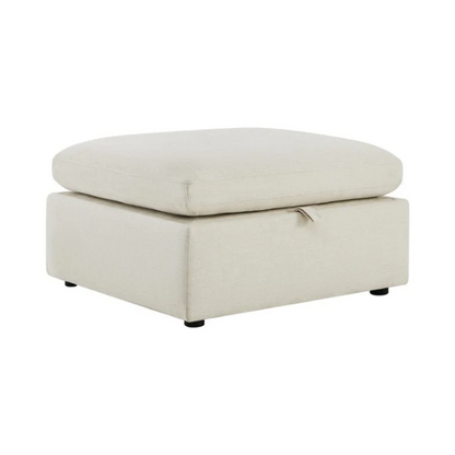 Beige modular four-piece sectional sofa with wide seats, soft chenille fabric, removable cushions, and built-in storage ottoman — ideal for modern and adaptable living room layouts.

