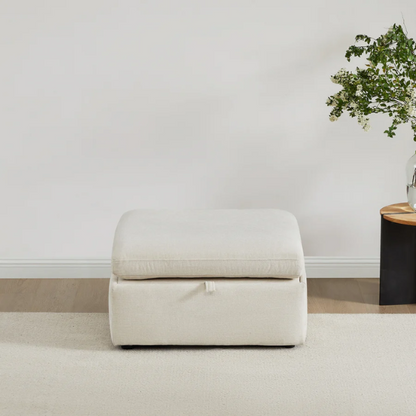 Beige five-piece modular sectional sofa with wide chenille-upholstered seats, two gas-lift storage ottomans, and reversible cushions — a modern and comfortable centerpiece for any living room.

