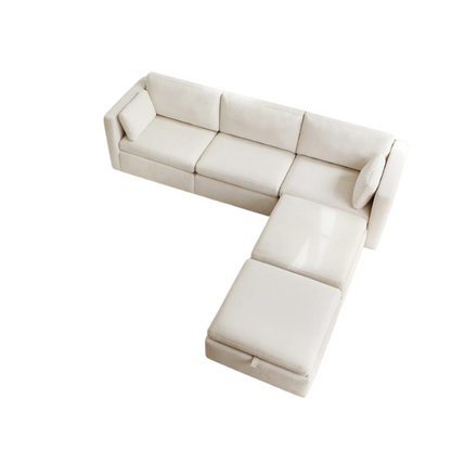 Beige five-piece modular sectional sofa with wide chenille-upholstered seats, two gas-lift storage ottomans, and reversible cushions — a modern and comfortable centerpiece for any living room.

