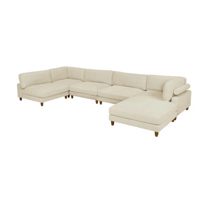 Beige modular sectional sofa with corduroy upholstery, removable cushions, and matching ottoman – seats six in a modern L-shaped or U-shaped layout with solid wood legs.

