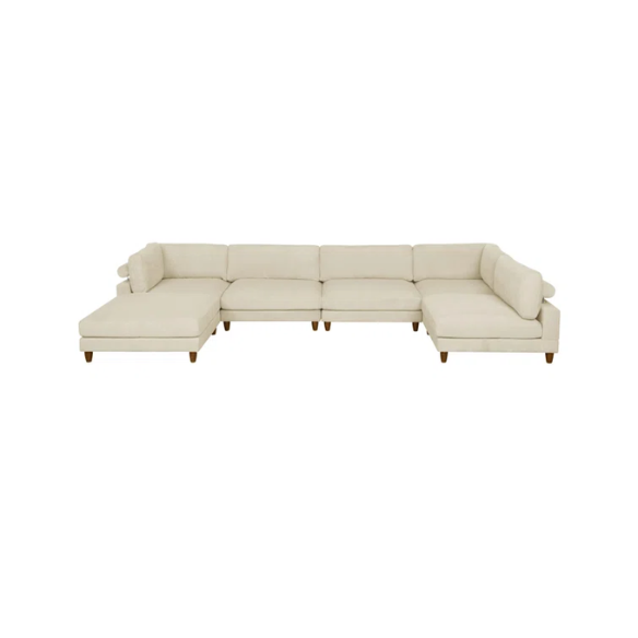 Beige modular sectional sofa with corduroy upholstery, removable cushions, and matching ottoman – seats six in a modern L-shaped or U-shaped layout with solid wood legs.


