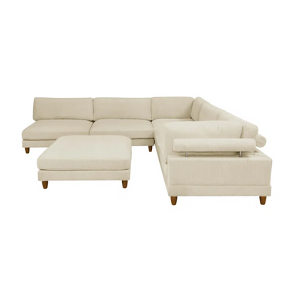 Beige modular sectional sofa with corduroy upholstery, removable cushions, and matching ottoman – seats six in a modern L-shaped or U-shaped layout with solid wood legs.

