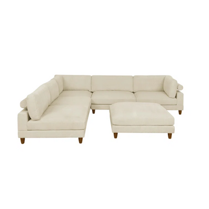 Beige modular sectional sofa with corduroy upholstery, removable cushions, and matching ottoman – seats six in a modern L-shaped or U-shaped layout with solid wood legs.

