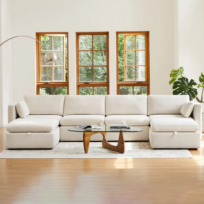 Beige six-piece modular sofa set featuring wide chenille-upholstered seats, two storage ottomans with gas-lift lids, and reversible cushions — ideal for contemporary, mid-century, or transitional interiors.

