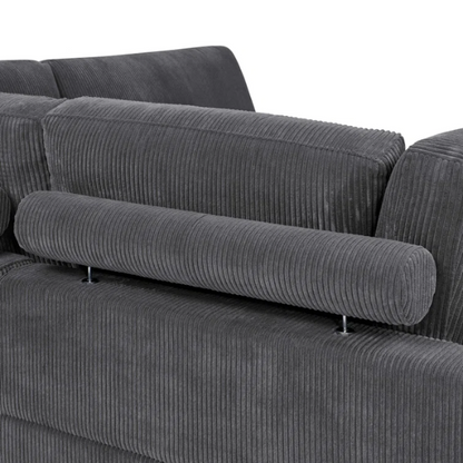 Dark grey modular sectional sofa with soft corduroy upholstery, matching ottoman, and removable cushions — seats six with flexible L- or U-shaped configurations.

