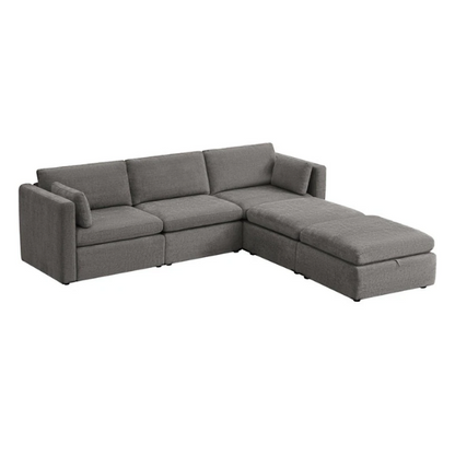 Dark grey five-piece modular sectional sofa with wide chenille-upholstered seats, two gas-lift storage ottomans, and reversible cushions — perfect for flexible and modern living spaces.

