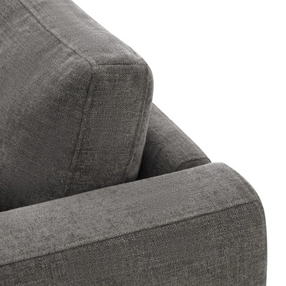 Dark grey five-piece modular sectional sofa with wide chenille-upholstered seats, two gas-lift storage ottomans, and reversible cushions — perfect for flexible and modern living spaces.

