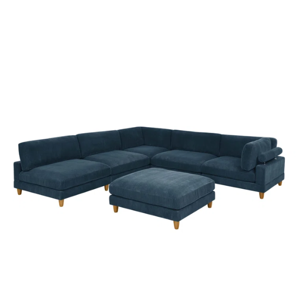 Deep teal modular sectional sofa with plush corduroy fabric, removable cushions, and a matching ottoman — seats six in flexible L- or U-shaped configurations.

