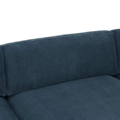 Deep teal modular sectional sofa with plush corduroy fabric, removable cushions, and a matching ottoman — seats six in flexible L- or U-shaped configurations.

